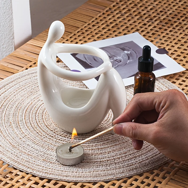 مبخرة سيراميك على شكل جسم الإن - مراجعة Home Fragrance Oil Burner وسعره